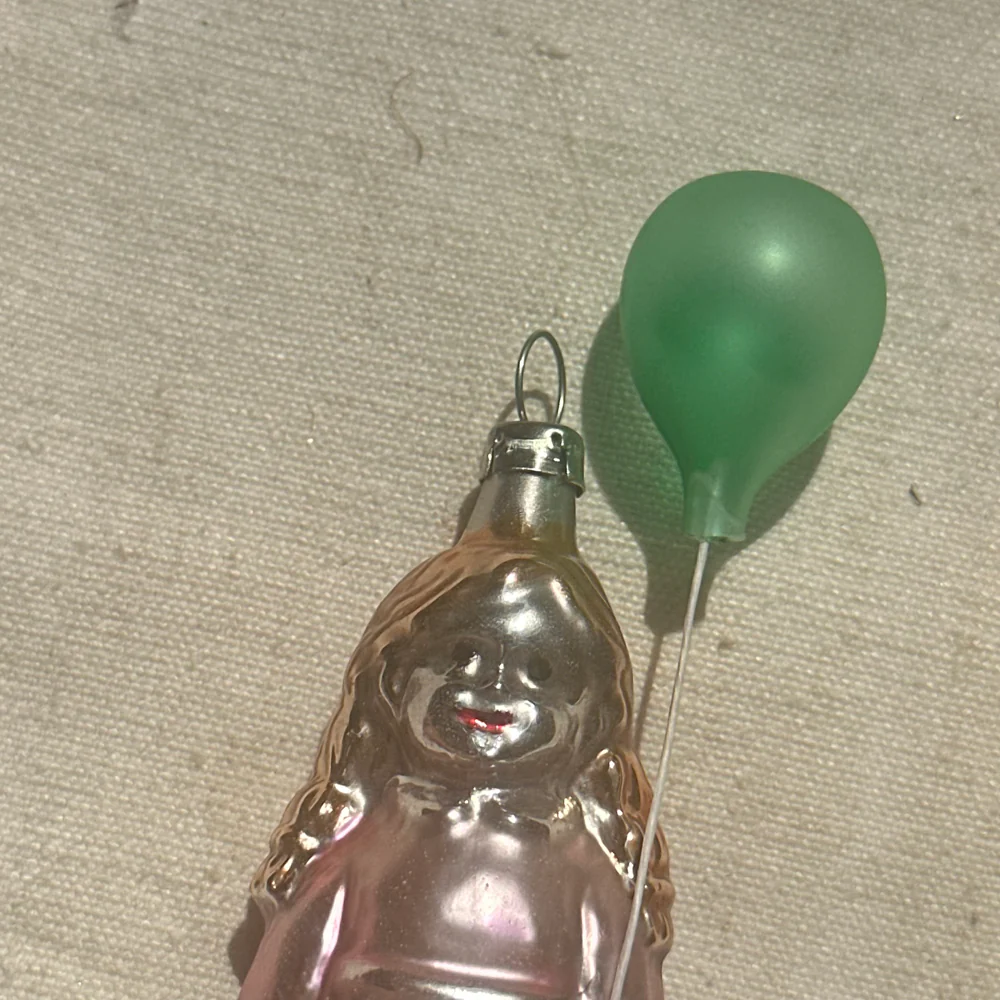 Nostalgic Girl Holding Balloon Ornament - Image 2